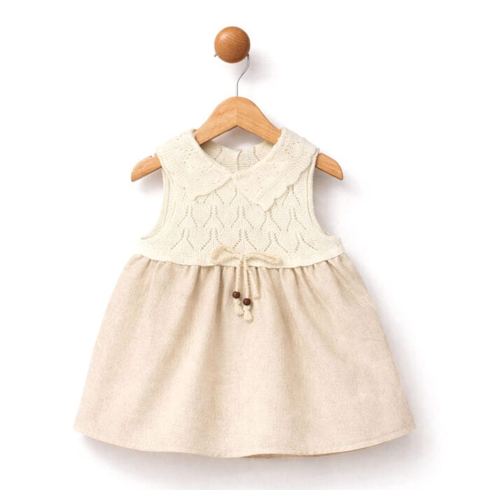 Βρεφικό φόρεμα λινό μπεζ με πλεκτό επάνω μέρος και αμάνικο σχέδιο